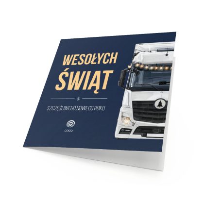Okładka biznesowej kartki świątecznej Camion z przodem białej kabiny ciężarówki i łańcuchem żarówek na granatowym tle.